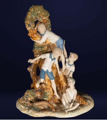 une image représentant une figurine d'une femme et de deux enfants
