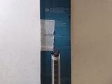 an image of a box with a black and white air purifier inside of it