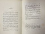 an open book with a picture of a cat on it