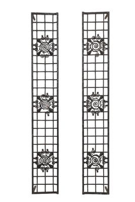 pair of wrought iron wall hangings with sun design