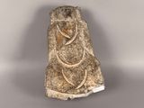 an image of a stone statue of a woman with a flower in her hair