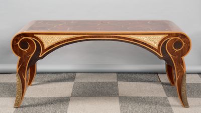 an image of a wooden table with a marble top on a checkered floor