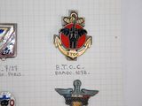 a lot of badges that are on a piece of paper
