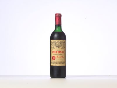 a bottle of wine that is sitting on a table