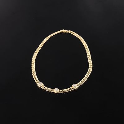 Collier en or 18k (750e) composé d'une maille gourmette plat… - Photo 1