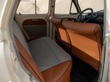a view of the inside of a car with the driver ' s seat up