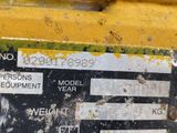 a close up of a sign on the side of a yellow truck