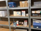 many shelves with various items on them in a room