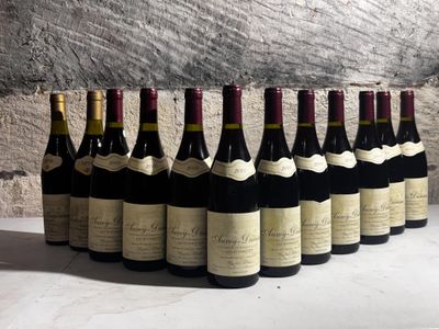 bottles of wine lined up in a row on a table