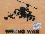 a cardboard box with a drawing of a war scene on it
