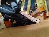 a pile of books and a pair of scissors on a table