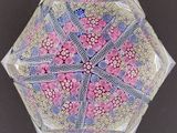 a picture of an umbrella with a flower pattern on it