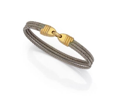 a cable bracelet with a gold clasp on a white background
