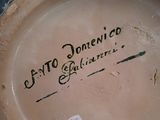 a close up of a plate with writing on it
