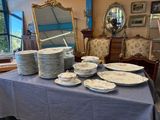 a table with a lot of plates and bowls on it