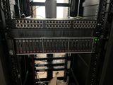 a picture of a rack of computer equipment in a server room
