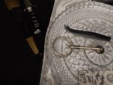 a glass plate with a pair of scissors on top of it