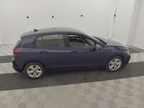 a picture of a purple car parked in a garage