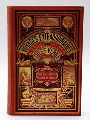un livre rouge avec des lettres dorées sur la couverture