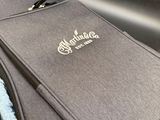 a guitar case sitting on top of a guitar case