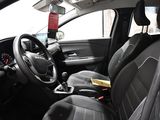 the interior of a car with black leather seats and a steering wheel