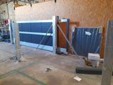 an image of a garage with a blue garage door