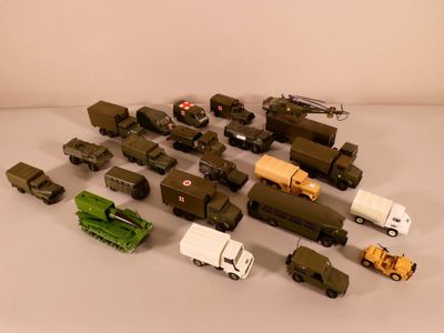 a lot of military vehicles and trucks on the table