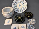 many plates and bowls that are sitting on a table