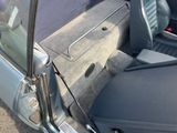 an image of the inside of a car with the door open