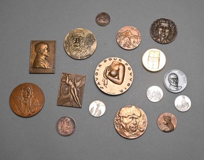 a lot of coins that are sitting on a table