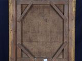 an old wooden easel with an empty canvas on it