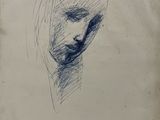 drawing of a woman ' s face on a piece of paper