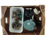 a cardboard box with a bunch of items in it