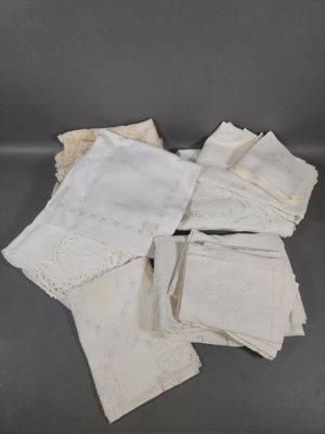 several pieces of white handkerchiefs on a gray surface