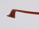 a close up of a pair of glasses on a white surface