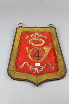 an image of a red and gold plaque with the number four on it