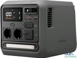 an image of a radio with a clock on top of it