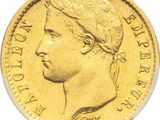 a close up of a gold coin with a woman ' s head on it