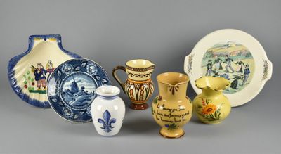 many different vases that are sitting on a table