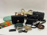 a lot of purses that are sitting on a table