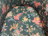 a chair that has a floral pattern on it