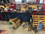 a garage with a lot of tools on the counter