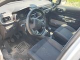 a picture of a car with a steering wheel and dashboard