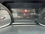 the dashboard of a car with a digital display on it
