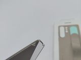 a box with a cell phone in it sitting on a table