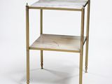an image of a marble topped side table on a white background