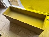 a yellow box that is sitting on the floor