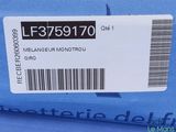 a close up of a blue box with a barcode on it