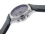 a close up of a watch on a white background