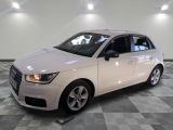 a picture of a white car in a showroom